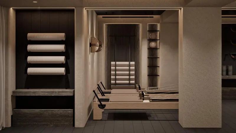 Spa corridor with towels and reformer beds