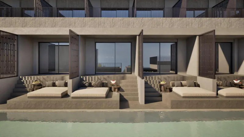 Private terrace daybeds facing pool