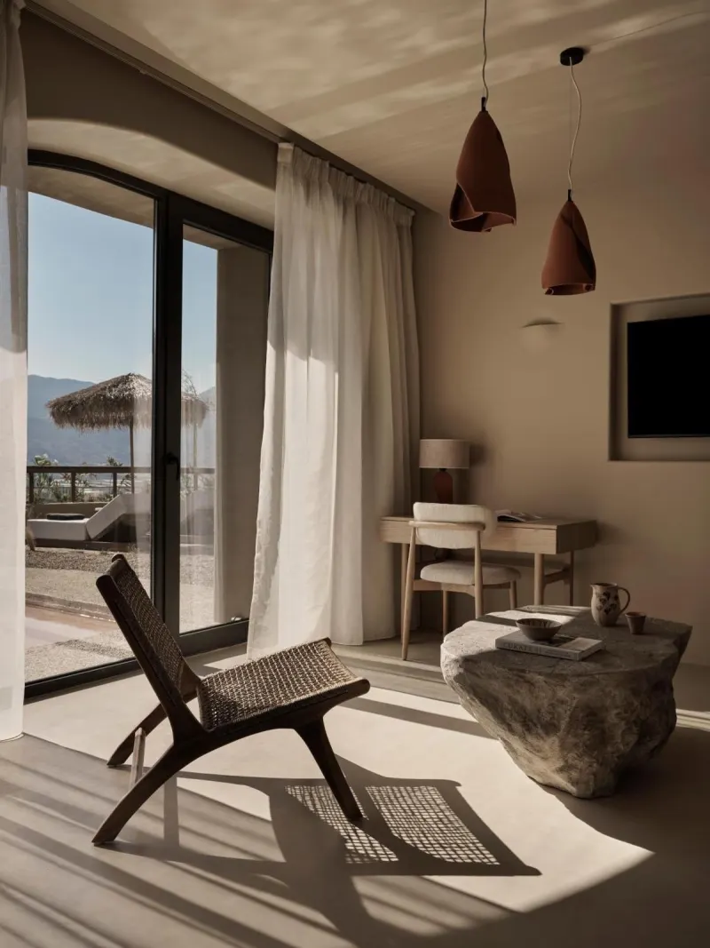 Sunlit reading nook with wicker chair