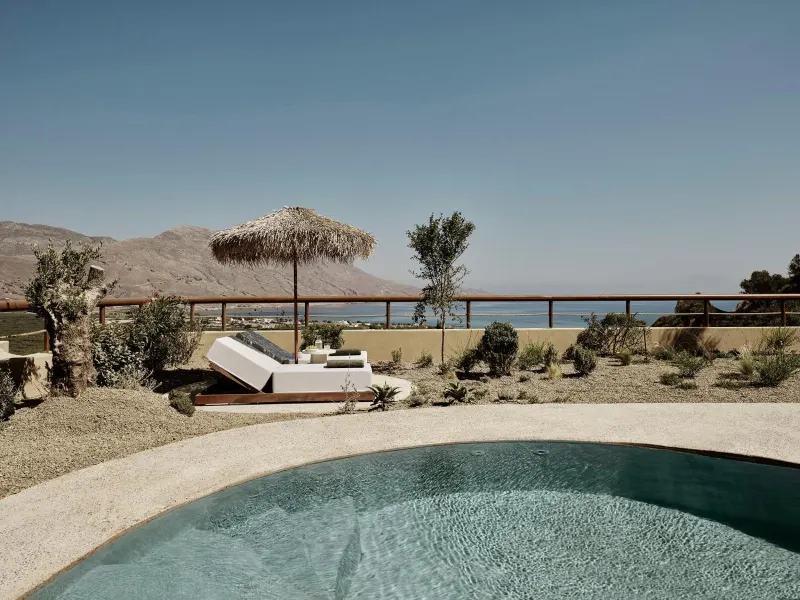 Private plunge pool overlooking sea and mountains