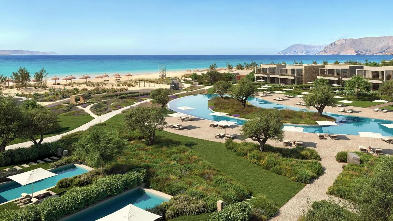 Resort pools and gardens overlooking the beach