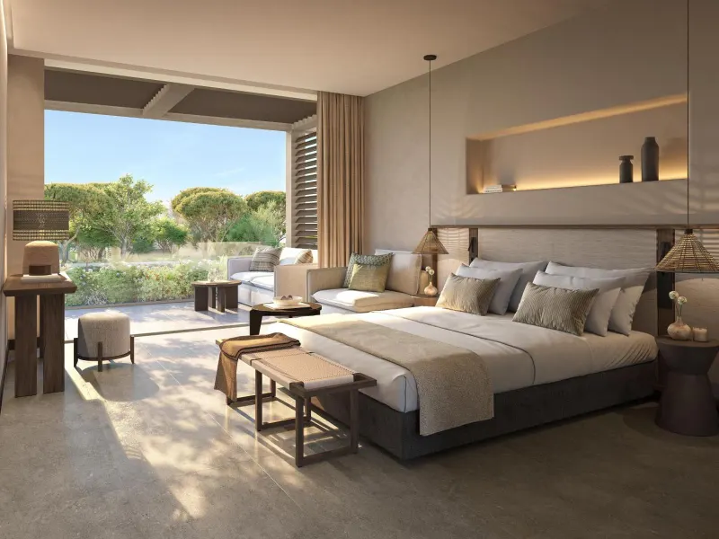 Bedroom opening to terrace with garden view