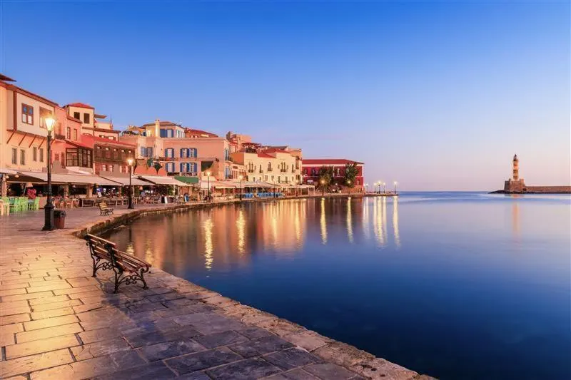 Historic harbor promenade at sunset