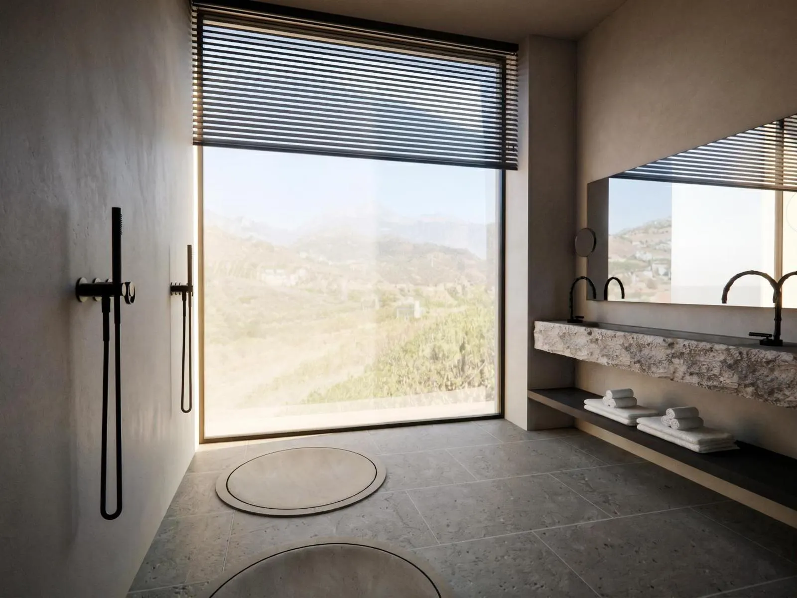 Bathroom with large window overlooking hills