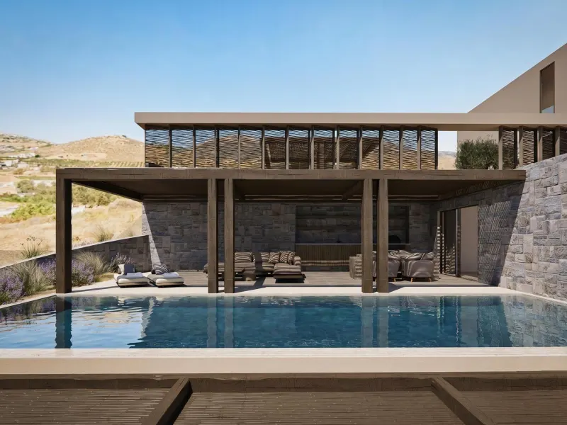 Poolside terrace with wooden pergola and seating
