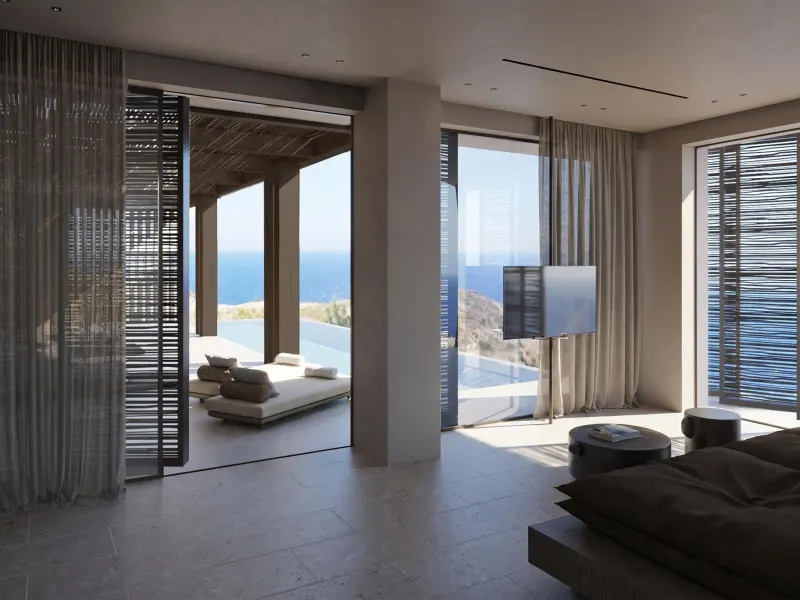 Bedroom opening to terrace with sea view