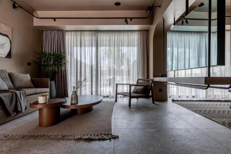 Living room with sofa and glass doors to terrace