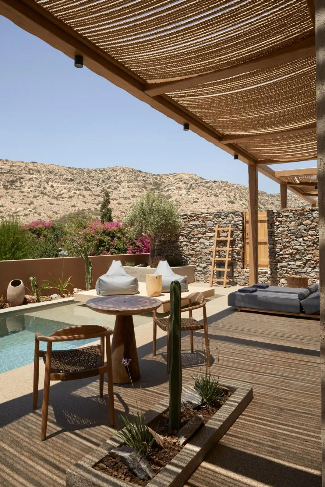 Terrace with pool, desert mountain view and pergola