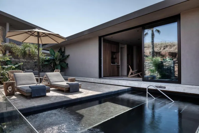 Private plunge pool terrace with loungers