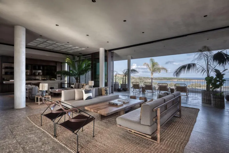 Open living room with sofas overlooking the sea