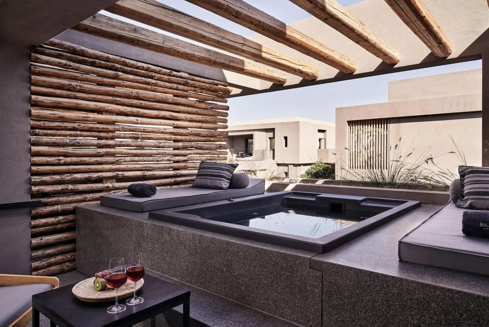 Rooftop jacuzzi terrace with wine and city view