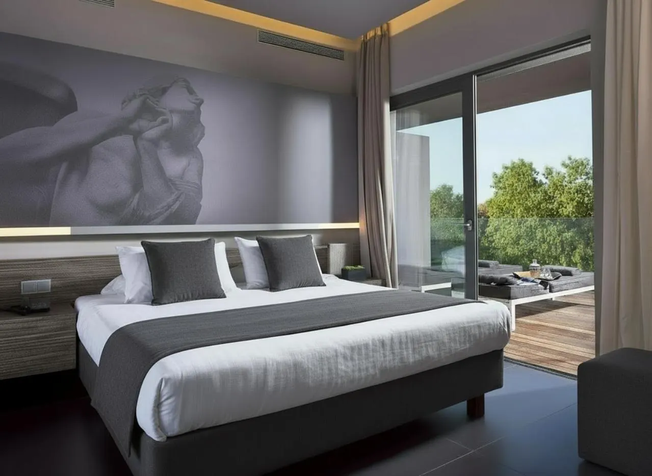 Modern hotel room with terrace and artistic mural
