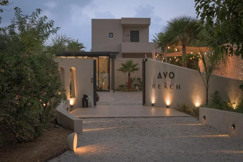 Illuminated villa entrance at night