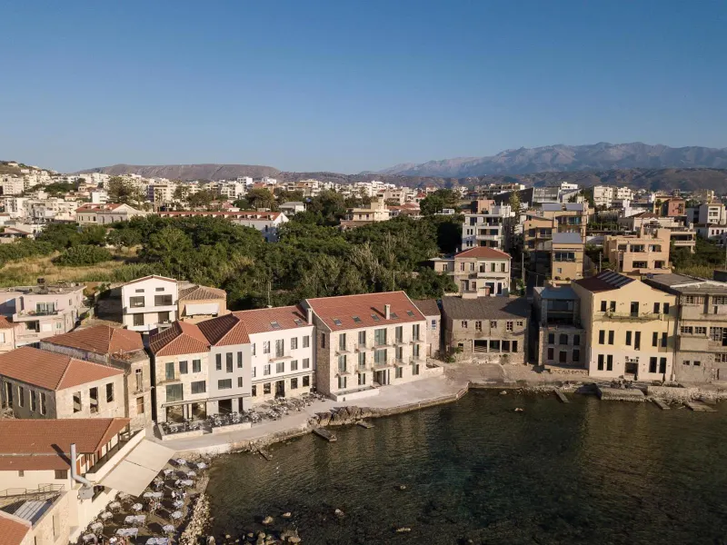Aerial view of coastal town and hotel buildings