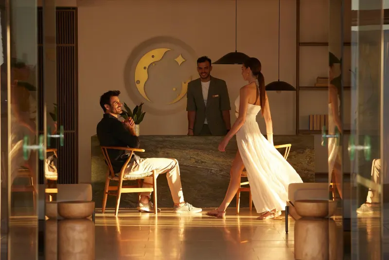 Guests walking through elegant lobby lounge