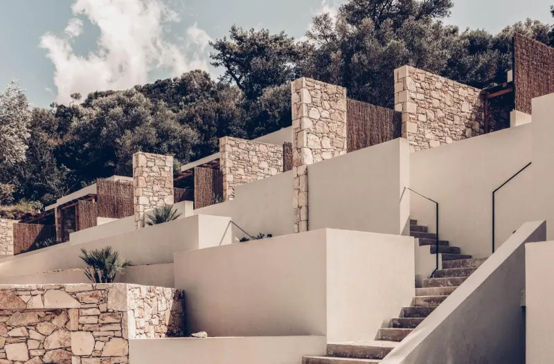 Stone and white staircase architecture on hillside
