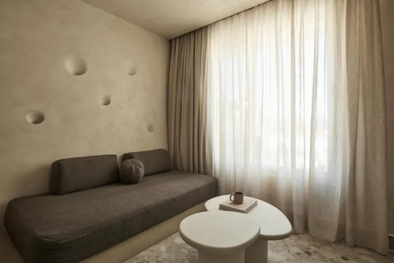Cozy sofa nook with round coffee tables