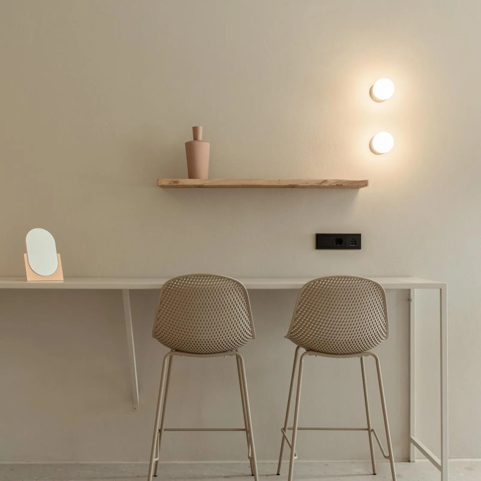 Minimalist bar stools and shelf decor