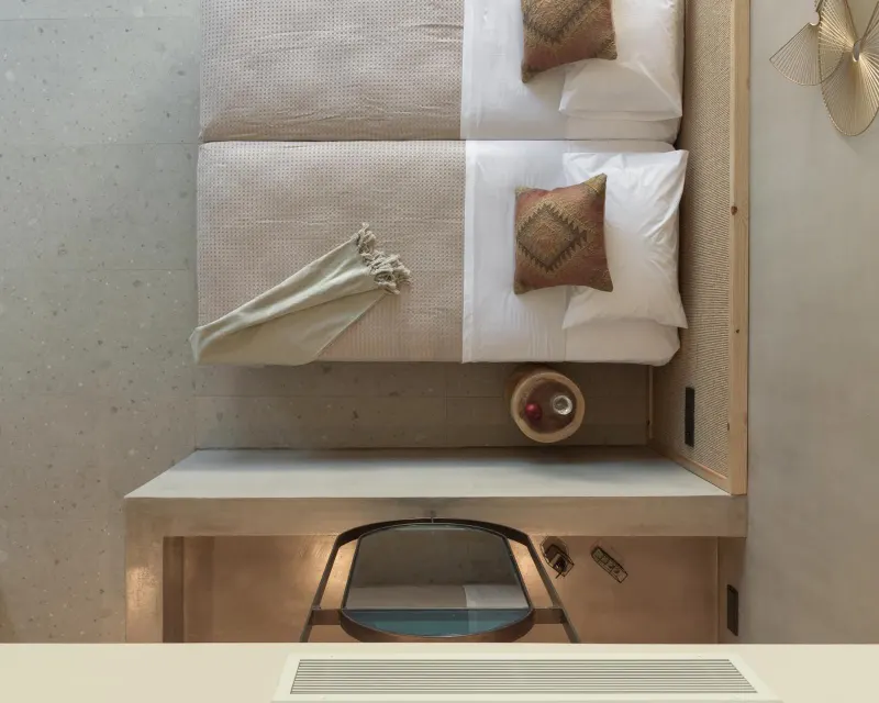 Top view of twin beds with linens