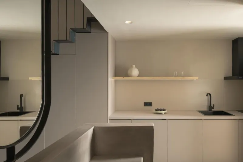 Modern kitchenette with staircase