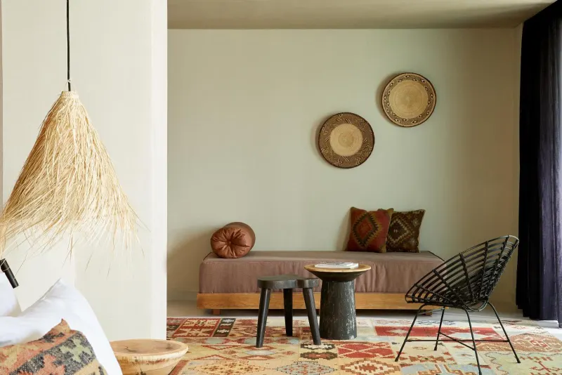 Sitting nook with woven baskets and patterned rug