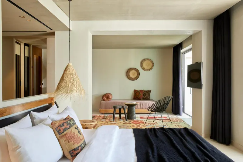 Bedroom with view into adjoining sitting area