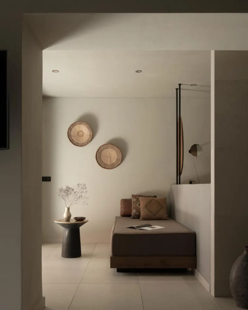 Cozy lounge nook with daybed and wall decor