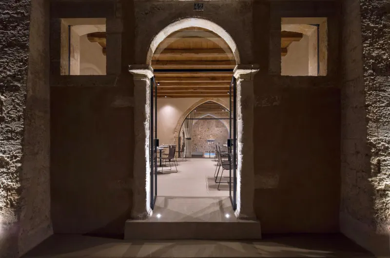 Arched stone doorway into dining hall