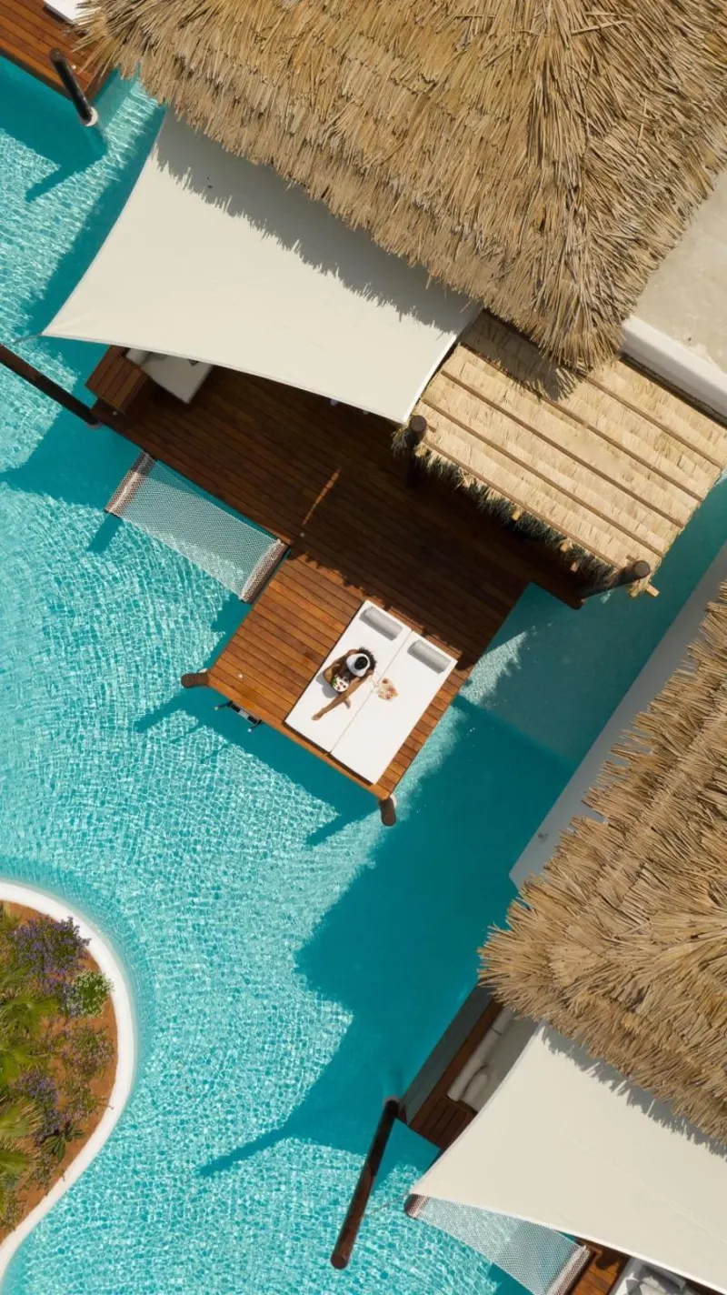 Aerial view of sunbathing deck between pools