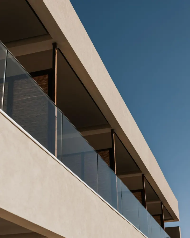 Architectural detail of balcony against blue sky