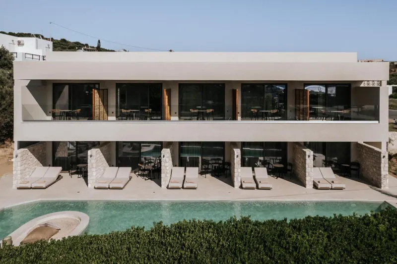 Exterior view of hotel with pool and terraces