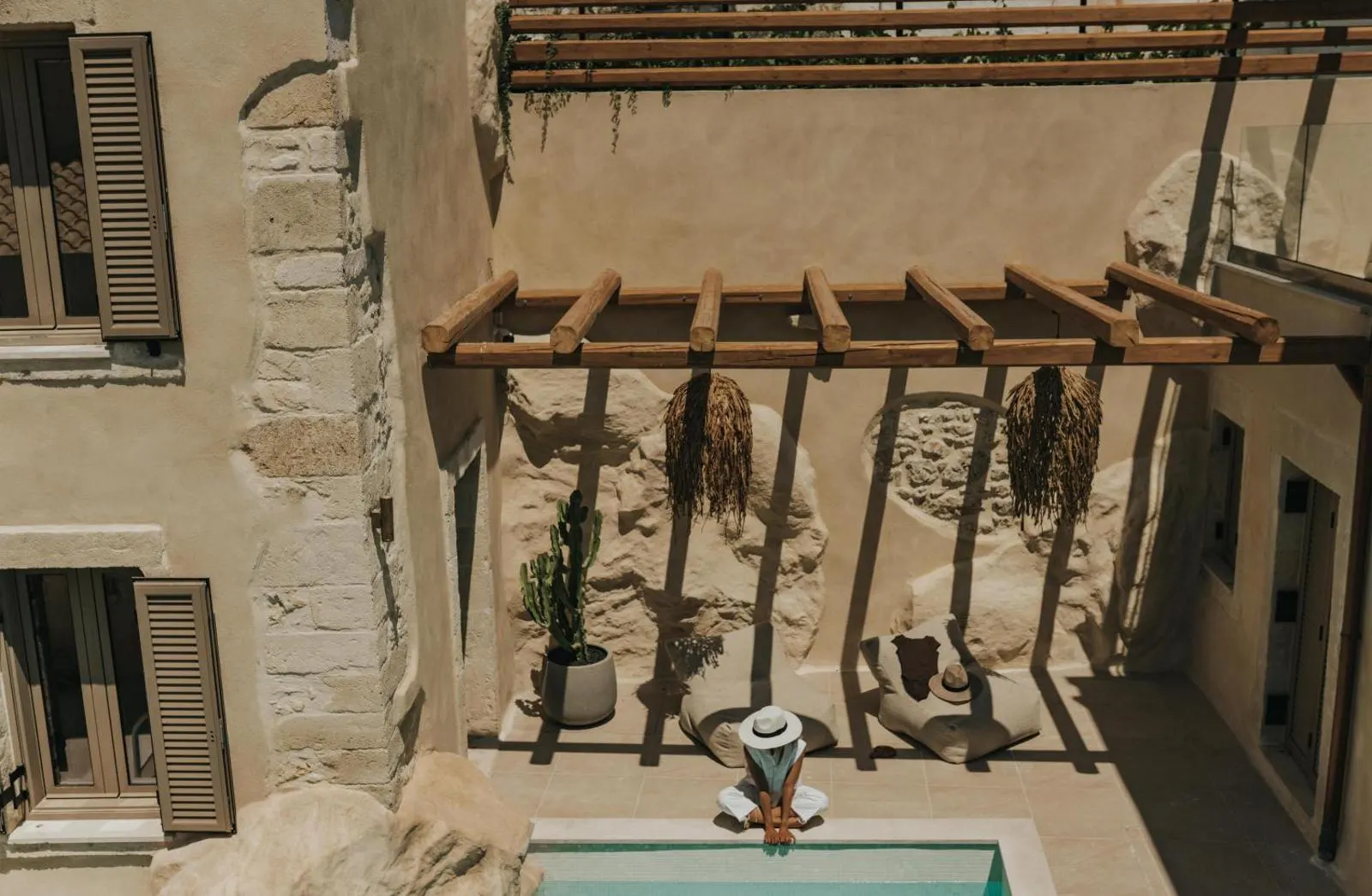 Aerial view of pergola and pool with guest