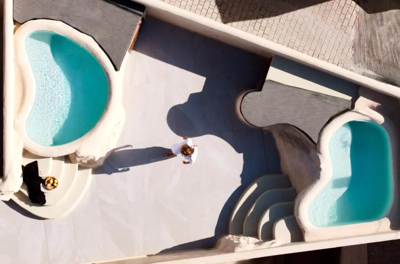 Aerial view of two curved plunge pools