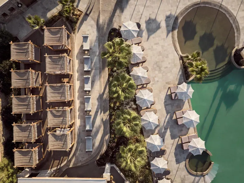 Aerial view of pool and cabanas