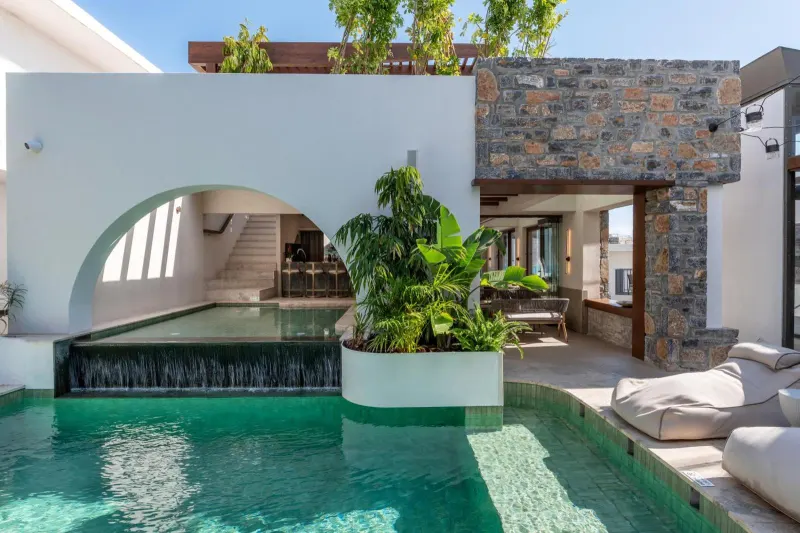 Courtyard pool with archway and water feature
