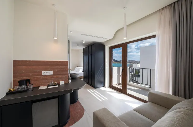 Living area with balcony and sea view