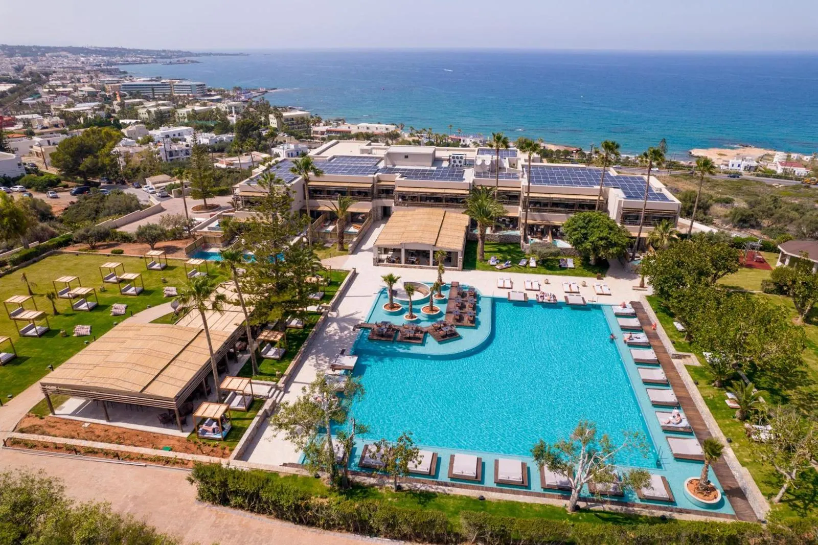 Aerial view of resort pool and coastline