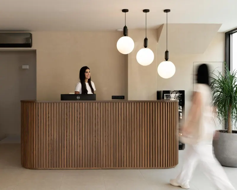 Hotel reception desk with pendant lights