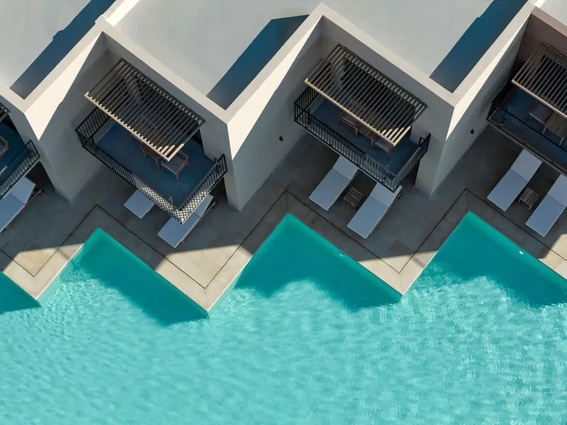 Overhead view of pool zigzag pattern by villas