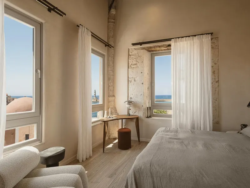 Bright bedroom with sea view windows