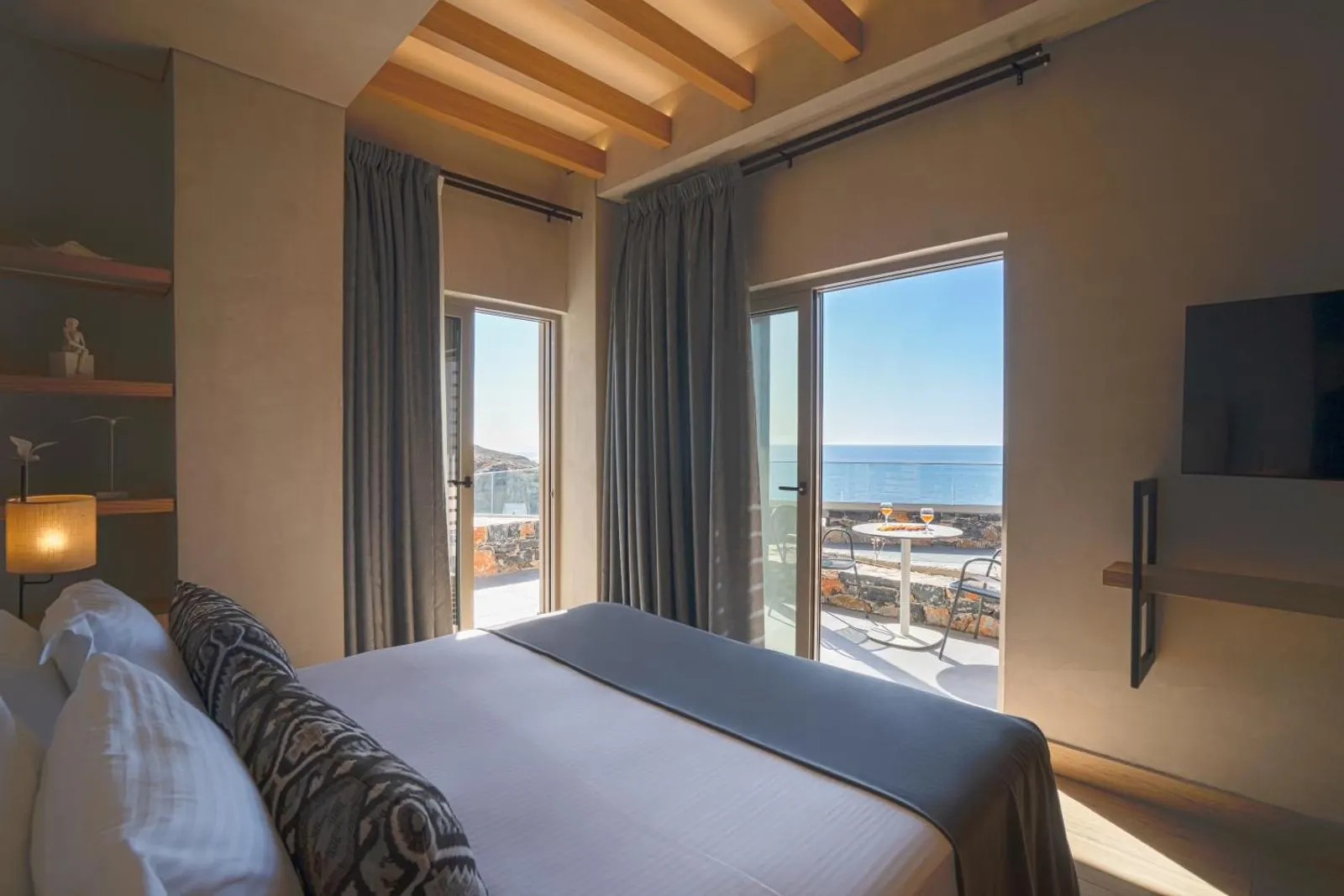 Bedroom with balcony overlooking the sea