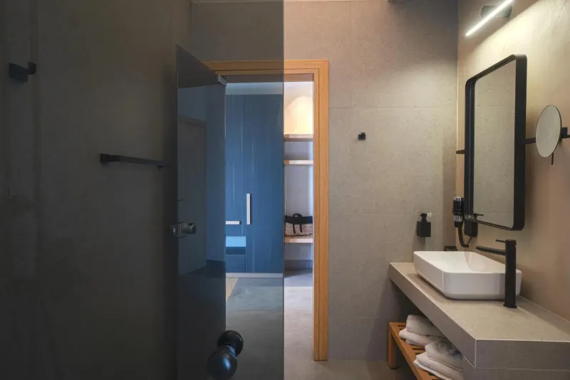 Modern bathroom with glass shower and mirror