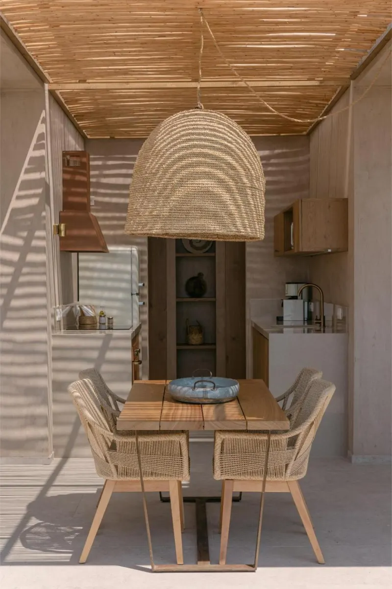 Covered outdoor dining area with kitchenette