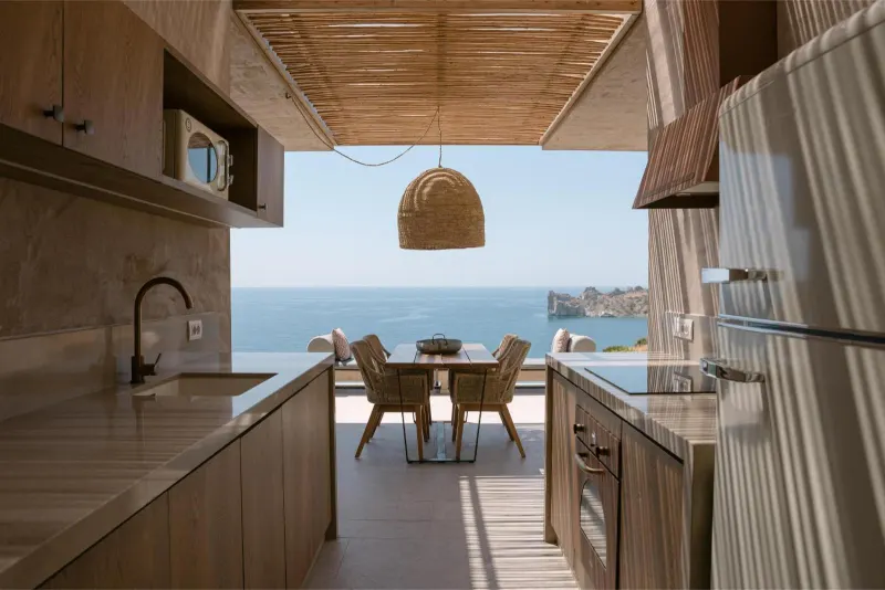 Kitchen with panoramic sea view through windows