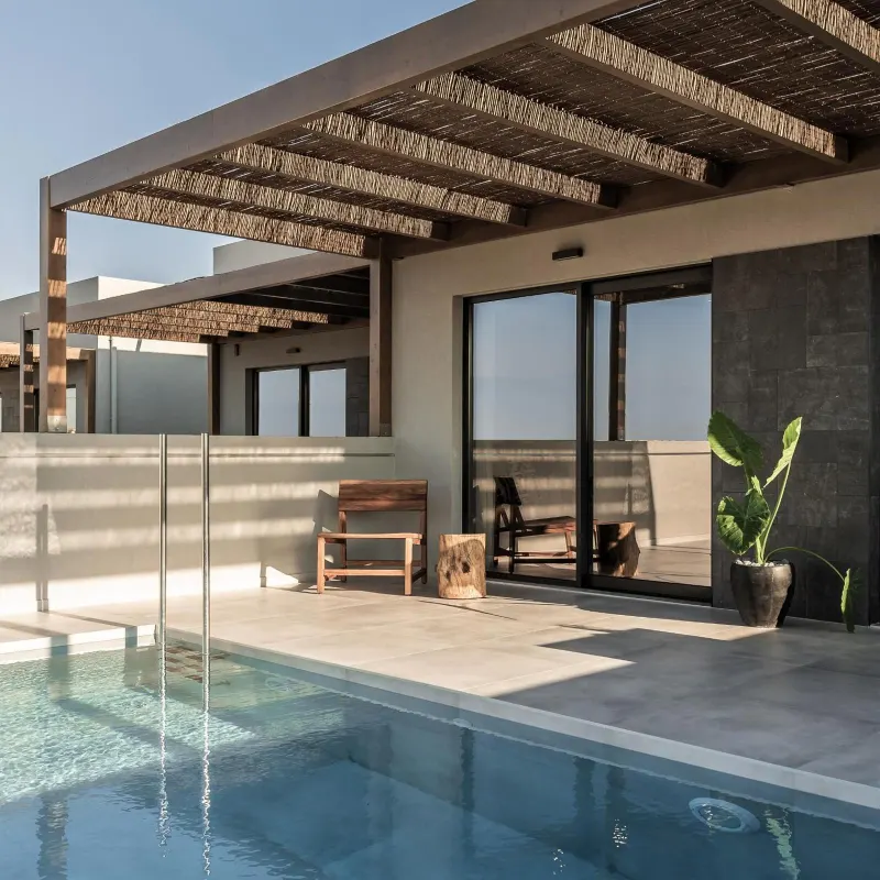 Private pool patio with pergola and outdoor seating