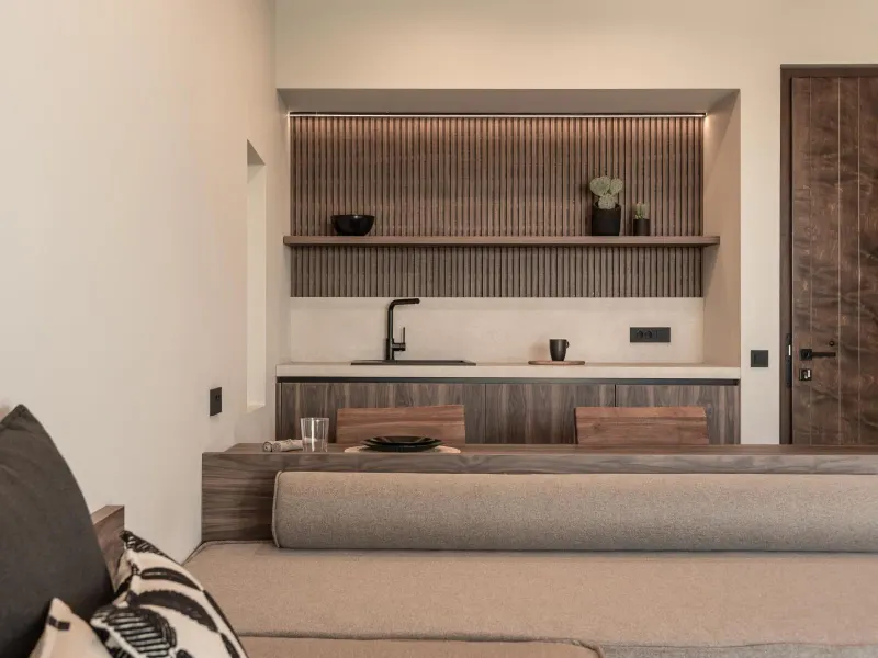 Compact kitchenette with wood paneling
