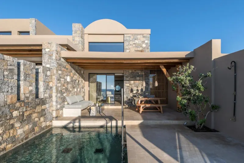 Private villa terrace with plunge pool and dining area